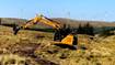 A digger at work on a peatland restoration site at Afton Reservoir, East Ayrshire A digger at work on a peatland restoration site at Afton Reservoir, East Ayrshire